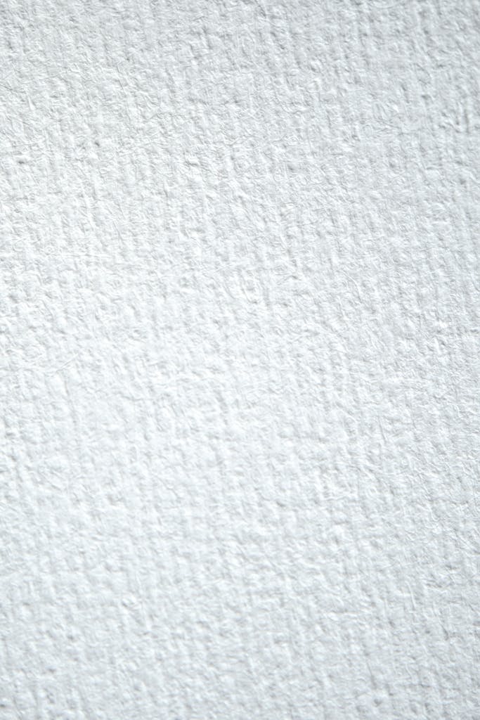 Close-up of a white textured surface suitable for backgrounds or design elements.